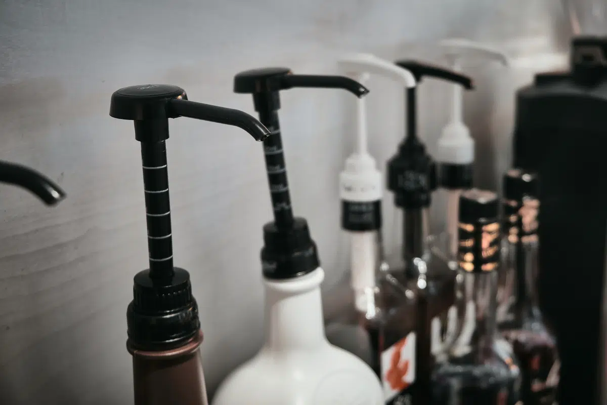 array of flavoring syrup bottles